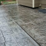 Residential stampped Concrete patio gray