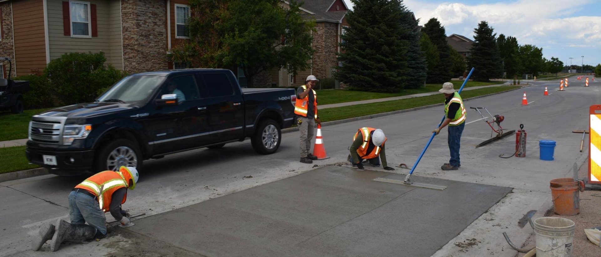 Concrete repair crew working in a roadway