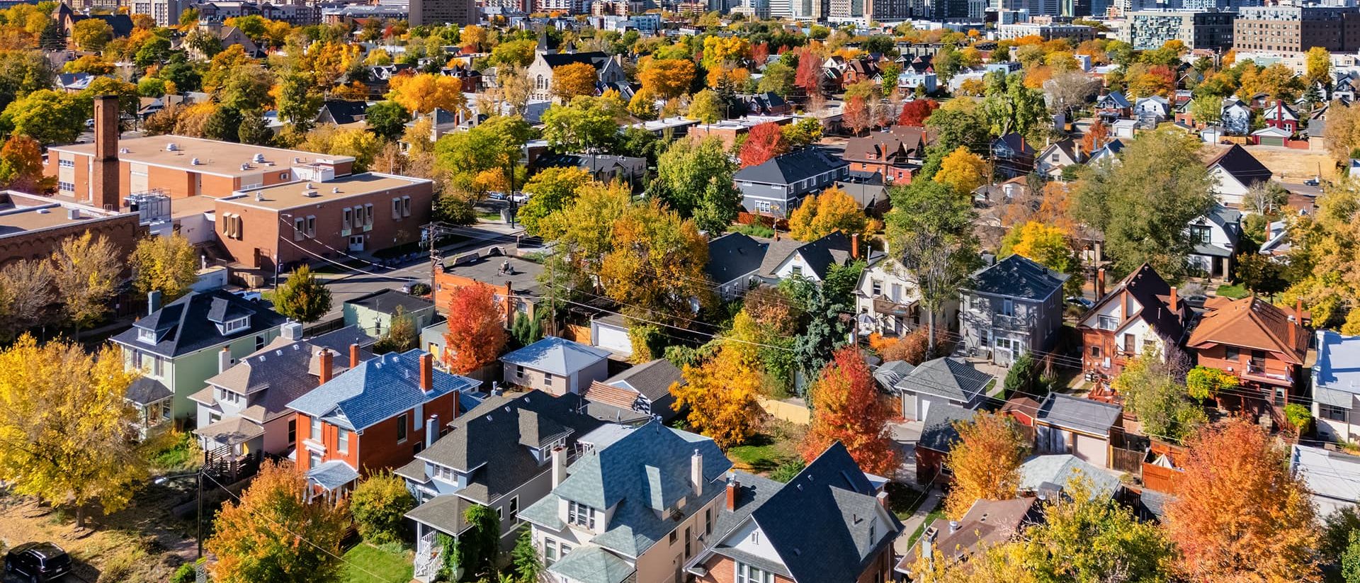 Denver skyline over residential neighborhoods